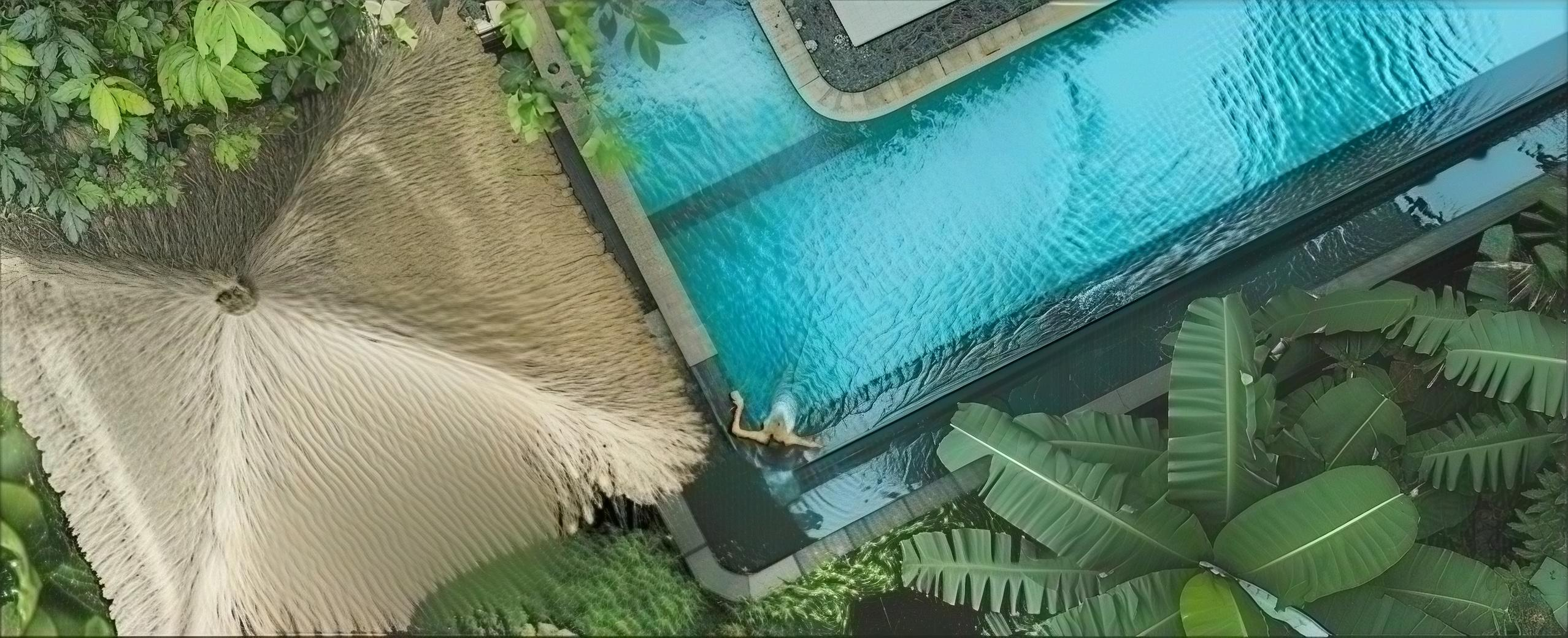Luxury poolside detail — natural fibre, stone and turquoise water