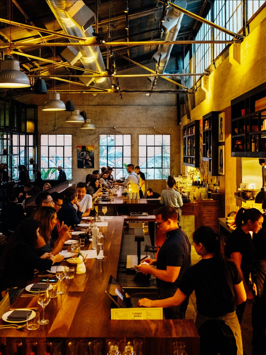 Mr. & Mrs. Hawker — open-kitchen dining room at Andaz Doha