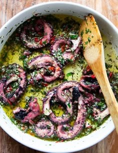 Bartender pouring layered foam cocktails
